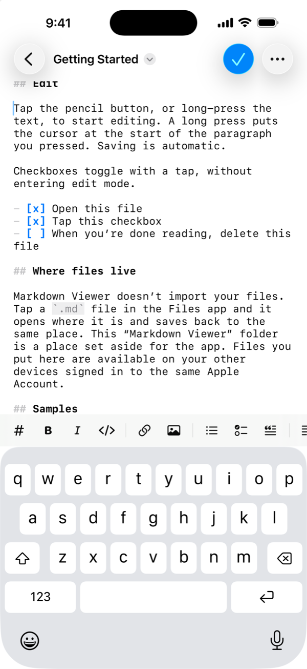 Edit mode: plain Markdown with syntax coloring, and a formatting bar above the keyboard